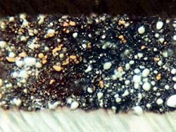 This Shows the gold dust has mixed through both layers of the paint